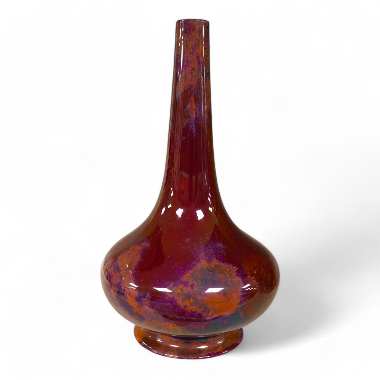 An early Royal Doulton flambé lustre bottle vase, early 20th century, 24cm high. Condition - good